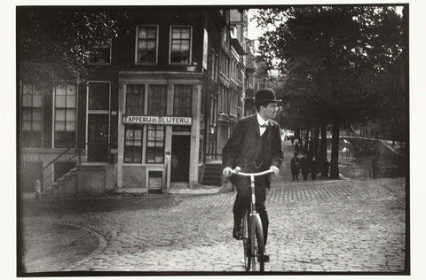 Cyclist on the Keizersgracht in Amsterdam, George Hendrik Breitner, c. 1890 - c. 1910 Canvas Print