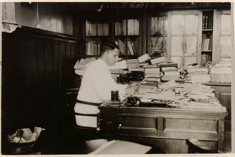 Man behind a desk, anonymous, 1900 - 1935 Canvas Print