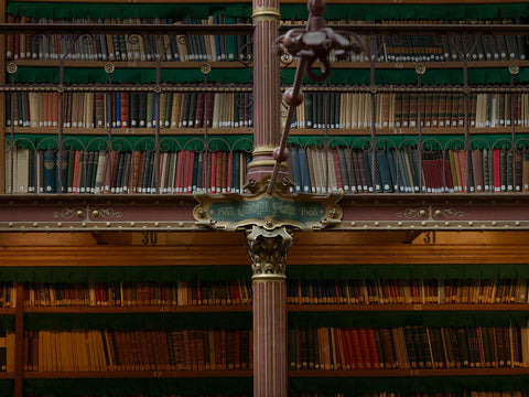 Cast iron column with a cartouche with the inscription 1583 Christopher Plantijn 1586 in the library, 2013 Canvas Print