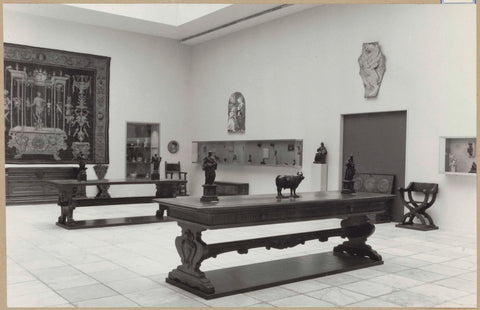 Room with tapestry, two tables, majolica, statues and a passage, 1961 Canvas Print