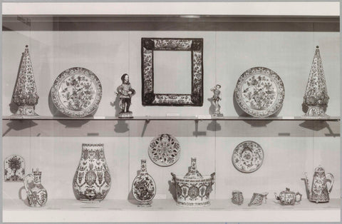 Display case with objects of Delft earthenware (polychrome), c. 1985 Canvas Print