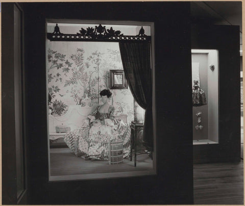 Display case with doll with clothing in an interior, 1962 Canvas Print