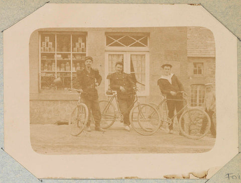 Three men with bicycles in military costume in front of a shop, presumably in France, anonymous, c. 1880 - c. 1900 Canvas Print