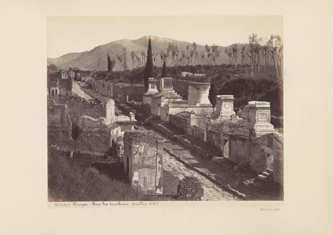 Remains of buildings on the Street with Tombs (Via delle Tombe) in Pompeii, with Vesuvius on the back, anonymous, c. 1865 - c. 1875 Canvas Print