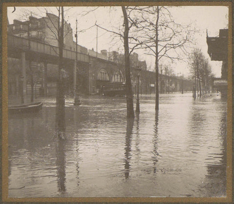 Flooded street near a railway viaduct during the flood of Paris, G. Dangereux, 1910 Canvas Print