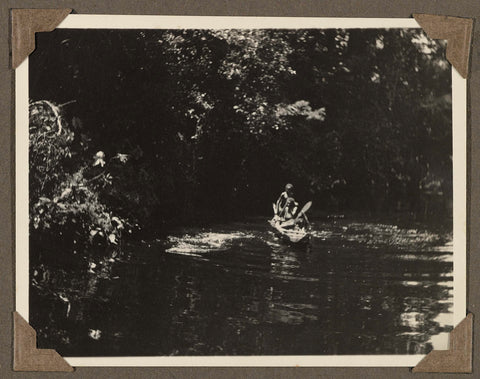 Villagers on a canoe on a river in Suriname, anonymous, 1925 - 1927 Canvas Print