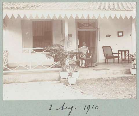 Man in a rocking chair on the porch of a house., Frits Freerks Fontein Fz. (attributed to), c. 1903 Canvas Print