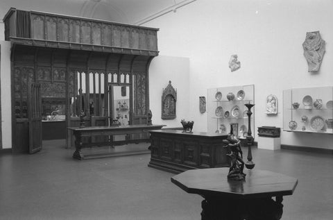 Room with ochre, furniture including a table, display cases, statues and a candlestick, 1953 Canvas Print