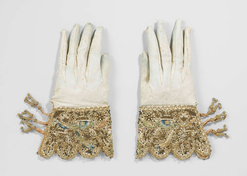 White wash leather glove, with scalloped gold-lace caps, acorns and silk bands embroidered with multicolored silk, gold thread and canetille and gilded sequins, anonymous, c. 1622 Canvas Print