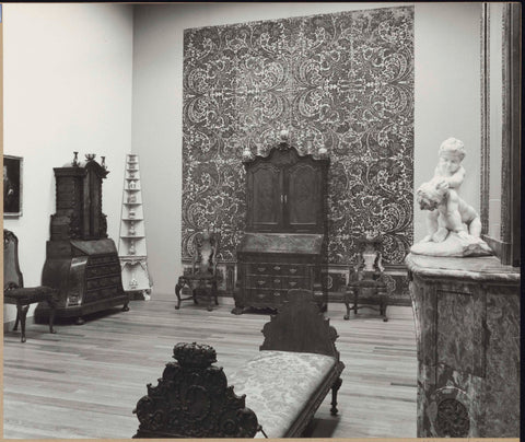 Room 169 with furniture including cupboards, chairs and a resting bench, a fireplace with statue and wall decoration, 1962 Canvas Print