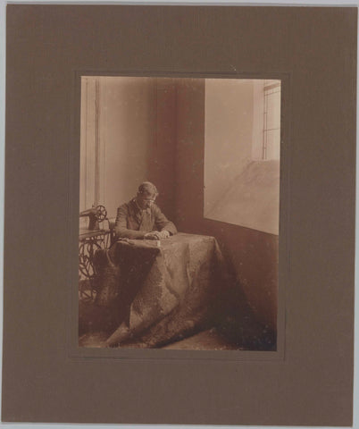 Conservator H.S. Bloedhouwer senior working on a carpet, c. 1920 Canvas Print