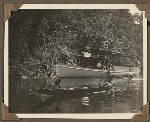 Riverboat and canoe on a river in Suriname, anonymous, 1925 - 1927 Canvas Print