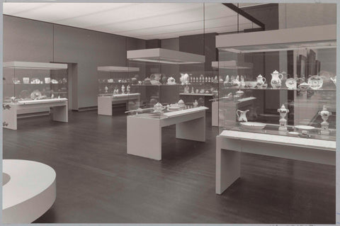 Room with various objects in display cases and a round bench for visitors, c. 1988 Canvas Print