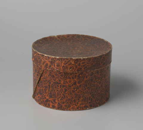 Round hat box made of cardboard, covered with