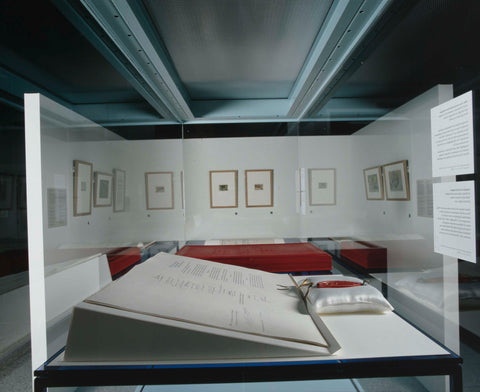 Room with various objects, in the foreground a document with a red seal on a cushion, c. 1999 - c. 2000 Canvas Print