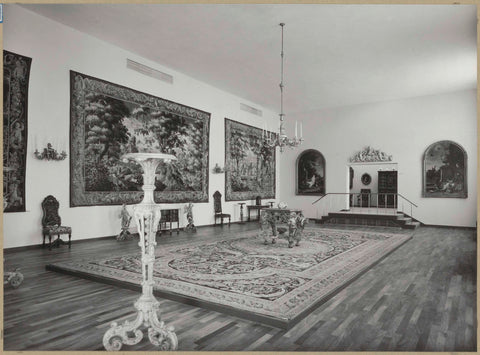 Room with tapestries and floor carpets, paintings, furniture and a staircase to a passageway, 1957 Canvas Print