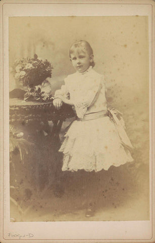 Portrait of Princess Wilhelmina as a Girl, Standing by a Table, anonymous, c. 1886 - c. 1888 Canvas Print