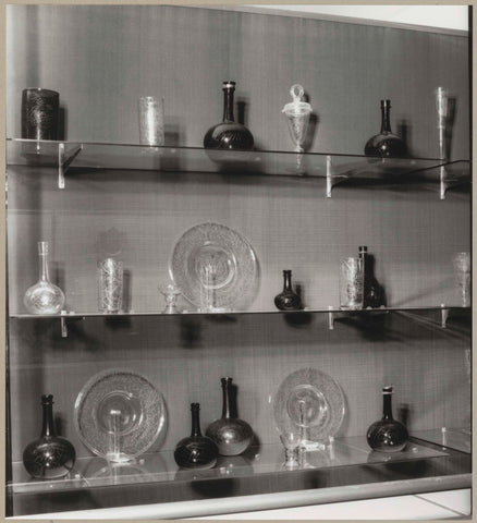 Display case with objects of glass, in or after 1962 - in or before 1993 Canvas Print