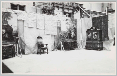 Two paintings, cupboard and chair against a background of sheets of paper or rags of fabric, 1957 Canvas Print