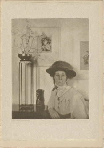 Portrait of an unknown woman with Japanese prints in the background, James Craig Annan, 1910 Canvas Print