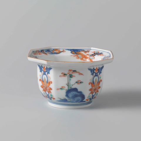 Octagonal bowl with flowering plants near a rock and floral scrolls, anonymous, c. 1680 - c. 1700 Canvas Print