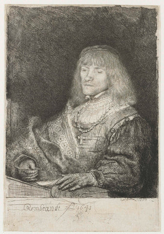 Man at a desk wearing a cross and chain, Rembrandt van Rijn, 1641 Canvas Print