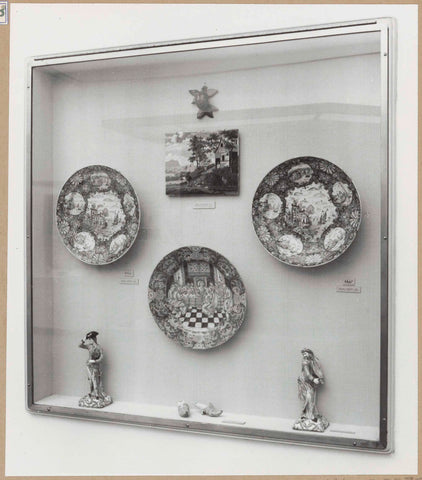 Display case with ceramic objects, including two mules of faience, c. 1959 Canvas Print