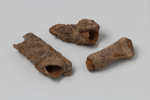 Three iron concrettiez warin the remains of wooden pens from the wreck of the in 1735 faded East Indiesman 't Vliegend Hart, c. 1700 - c. 1735 Canvas Print