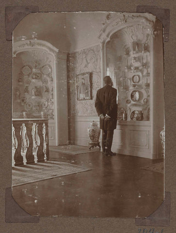 Mr Schmidt-Degener looks at porcelain in room 364., 1922 - 1923 Canvas Print