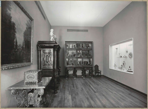 Corner of room 162 with furniture including a cupboard, a puppet show and a display case with metal objects, 1957 Canvas Print