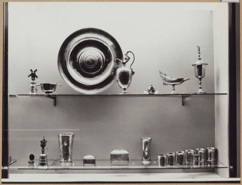 Display case with metal objects including a bowl, a jug and boxes, 1962 Canvas Print