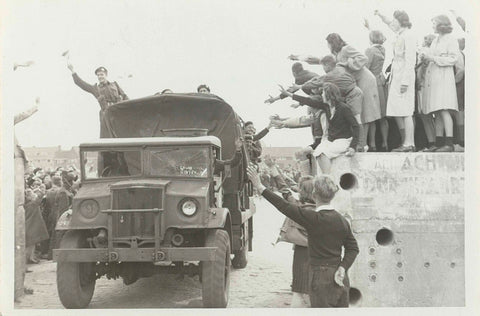 Canadian soldiers in vehicle are welcomed in Amsterdam, anonymous, 1945 Canvas Print