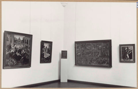 Corner of a room with five paintings, four of which are on the wall and one on a pedestal, 1961 Canvas Print