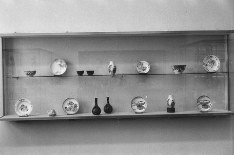 Display case with various objects of Chinese porcelain including vases, bowls and bowls, 1957 Canvas Print