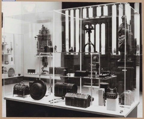 Display case with various objects including chests and an image, in the background an oksaal, c. 1959 Canvas Print