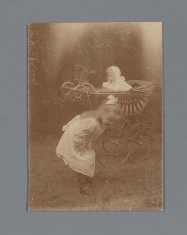 Portrait of Johanna Geertruida and Anne Madeleine van der Waals, Anne zit in een kinderwagen, Johannes Diderik van der Waals (1873-1971) (attributed to), 1906 - 1910 Canvas Print