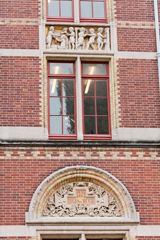 Boogveld Lucas d'Heer 1534-1584 and above it a relic of printing to the exterior of the library, 2013 Canvas Print