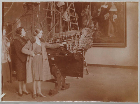 Three ladies pose on a model ship of the VOC in 1931, 1931 Canvas Print