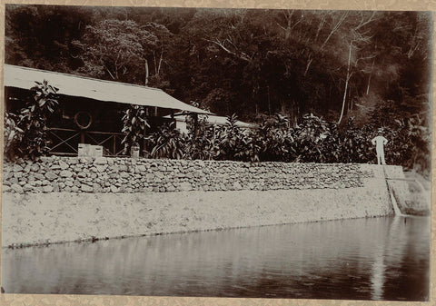 Houses with a stone wall with drainage, anonymous, 1903 - 1913 Canvas Print