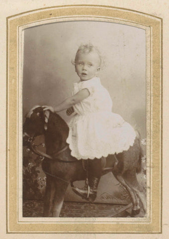 Portrait of a toddler in a dress on a rocking horse, Cornelis Johannes Lodewicus Vermeulen, c. 1890 - c. 1915 Canvas Print