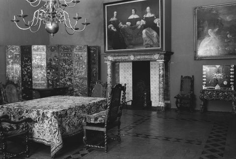 Room with paintings and furniture including table, chairs and a room screen, 1952 Canvas Print