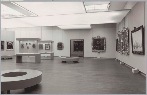 Room with various paintings and various frames, partly in display cases, a passage and a bench for visitors, c. 1984 Canvas Print