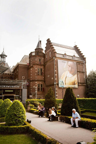 Visitors sitting in the garden in front of the Fragmentengebouw, at the entrance, 2010 Canvas Print