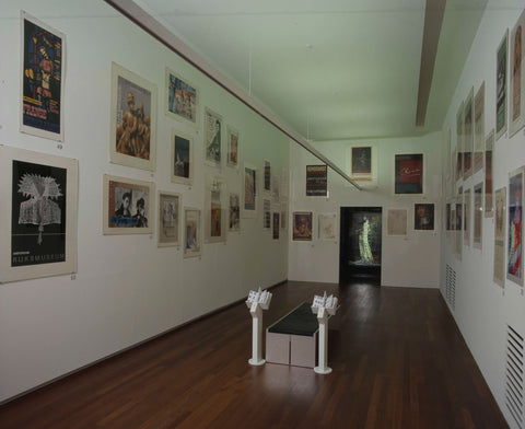 Room 114 with exhibition posters on the walls and a bench and leaflets for visitors, c. 2000 Canvas Print