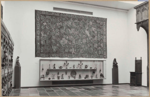 Room with tapestry, statues, an operating theatre and a display case with copper and bronze objects, 1961 Canvas Print