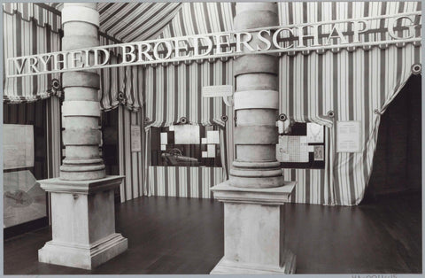 Room decorated as a tent with two pillars and built-in display cases with documents and a cannon model, c. 1991 Canvas Print