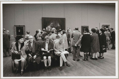 Visitors view the exhibition, on the left an usher, c. 1969 Canvas Print