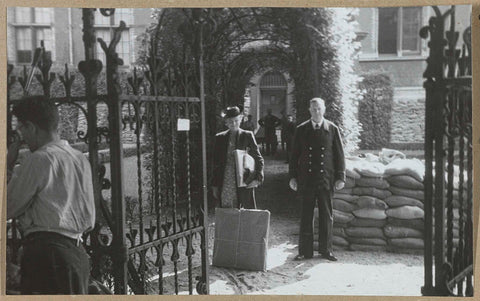 Mrs. Heukenfeldt-Jansen with a few packages at the entrance of the Print Room in 1939, 1939 Canvas Print