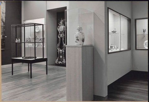 Passage with a view of two rooms with display cases with ceramics and a clockwork, 1962 Canvas Print