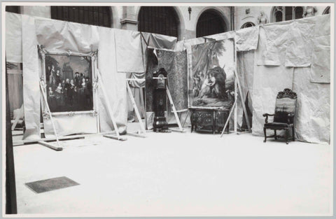 Two paintings, standing clock, dresser and chair against a background of sheets of paper or rags of fabric, 1957 Canvas Print